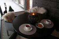 Aurinkotörmä - B&B Kuusamo
