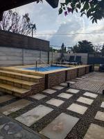 Casa con piscina climatizada para 6 personas en Parque del plata - Chambres d'hôtes Parque del Plata