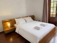 Quarto confortável em apartamento familiar - B&B Amadora