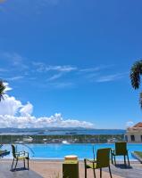 8Newtown Boulevard 1BR Poolside Stay Near Beach & Airport - B&B Binotongan