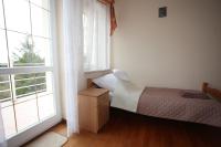 Kleine Tweepersoonskamer met 2 Aparte Bedden