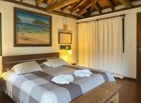 Chalé espaçoso c/ lareira, sauna e piscina. - B&B Passa Quatro