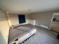 Bright apartment with a view by the sea - Chambres d'hôtes Hjelset