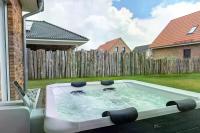 Salz & Seele Das Spa Ferienhaus mit Whirlpool, Sauna & Wallbox - B&B Büsum