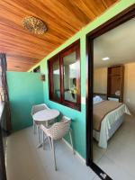 Doppelzimmer mit Balkon und seitlichem Meerblick