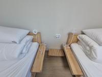 Single Bed in Male Dormitory Room
