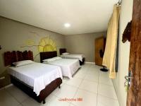 Suíte em Pousada em Rio Grande com Piscina e Vista - Bed and Breakfast Palmeiras