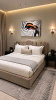 شقة بالخبر أنيقة بغرفتين نوم وصالة - Bed and Breakfast Khobar