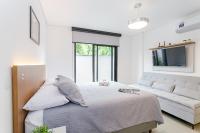 Apartamento 101 - Eixo · Studio c/ Garden Privativo e Cozinha Completa - Ferienwohnung Curitiba