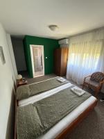 Kamer met Kingsize Bed en Uitzicht op de Tuin