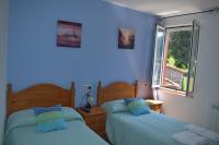 Zweibettzimmer mit Gartenblick