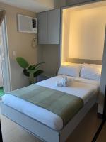 Sunset View in Venice Grand Canal Mall Suite, Pet Friendly, Walking distance to Venice Mall, 5 mins away to BGC - Chambres d'hôtes Manille