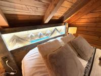 LE GRIZZLY Chalet en bois avec SPA Jacuzzi - B&B La Bresse