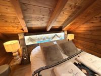 LE GRIZZLY Chalet en bois avec SPA Jacuzzi - B&B La Bresse
