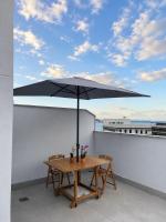 COBERTURA Uni Home 1003 - ESTILO, CONFORTO, ESPAÇO E BELÍSSIMA VISTA DA BAÍA DE GUANABARA E DO RIO DE JANEIRO - B&B Niterói
