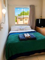 Quarto confortável em residência Familiar - WiFi - Netflix -Frigobar próx ao Aeroporto - B&B Navegantes