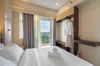 The Horizon Suite - 2BR with Balcony, Mountain View, Cinema, Smart Toilet, Free Parking - Chambres d'hôtes Baguio