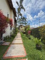 Casinha 100mts da praia, com piscina e 2 suítes com ar condicionado - Chambres d'hôtes Bertioga