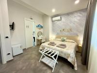 Chambre Double avec Balcon (2 Adultes + 1 Enfant)