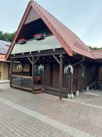 Agroturystyka FIFI Domek drewniany z 2 sypialniami - Chambres d'hôtes Młynary