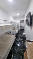 Chambre Quadruple avec Salle de Bains Commune