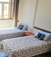 Chambre Lits Jumeaux avec Salle de Bains Commune