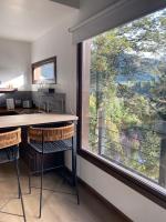 One-Bedroom Apartment with Balcony and Mountain View  