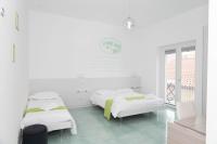 Chambre Triple avec Balcon