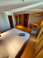 Flat na Barra da Tijuca - Premium - Com ou sem Cozinha, Frigobar, Estacionamento, Balsa para Praia, Academia, Muito lindo, Confortável e Aconchegante - Chambres d'hôtes Rio de Janeiro