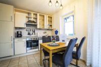 Ferienwohnung-Wohlfuehleck-in-der-Ferienanlage-Suedblick - B&B Werdum