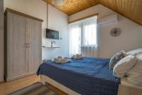 Pávics Apartmanok - B&B Balatonboglár