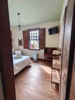 CASA RAIZ cama café e prosa - B&B Ouro Preto