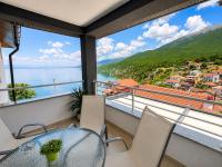 Appartement met uitzicht op het meer