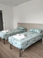 Tweepersoonskamer met 2 Aparte Bedden