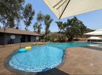 Arka Homes Bhor Serene Nature 2BHK Villa with Bonfire, BBQ, lawn, shared pool and Kayaking - Bed and Breakfast Karondi Khurd