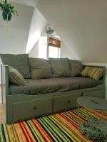 Romantic loft apartment with a little balcony - B&B Mrągowo