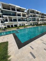 Appartement de luxe - Vue sur mer & 2 piscines - B&B El Mansouria