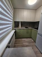 Taikos apartamentai - B&B Utena