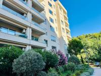 Refined 1bd apartment with an outdoor pool and sea view - B&B Bečići