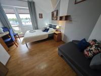 Chambre Triple avec Balcon