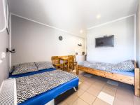 Dreibettzimmer mit Balkon