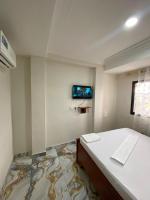 Studios climatisé au goudron à Yaoundé Nsimeyong 100m du collège Vogt,50m super marché DOVV WIFI haut débit gratuit 21 R&B - B&B Yaoundé