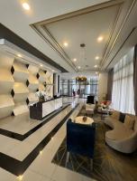 Eastwood QC 2BR Condo Walk to Mall Cafés & Dining - Bed and Breakfast Manilla