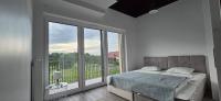 Villa nad stawem - Ferienwohnung Pszczew