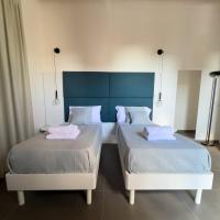 Tweepersoonskamer met 2 Aparte Bedden en Eigen Badkamer