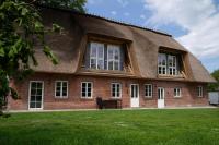 Das Reetdachhaus der Familie Sommer - Bed and Breakfast Scheggerott