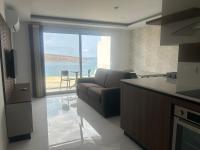 Gorgeous 1-BR Seaview Apartment - Chambres d'hôtes San Pawl il-Bahar