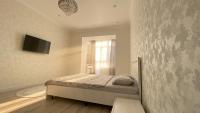 Уютная однушка в мкр Батыс-2 - B&B Aktobe