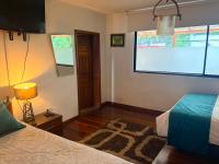 Habitación Doble Deluxe con cama supletoria