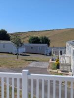 Pet friendly holiday home with wrap around deck at Durdledoor Holiday Park - B&B West Lulworth